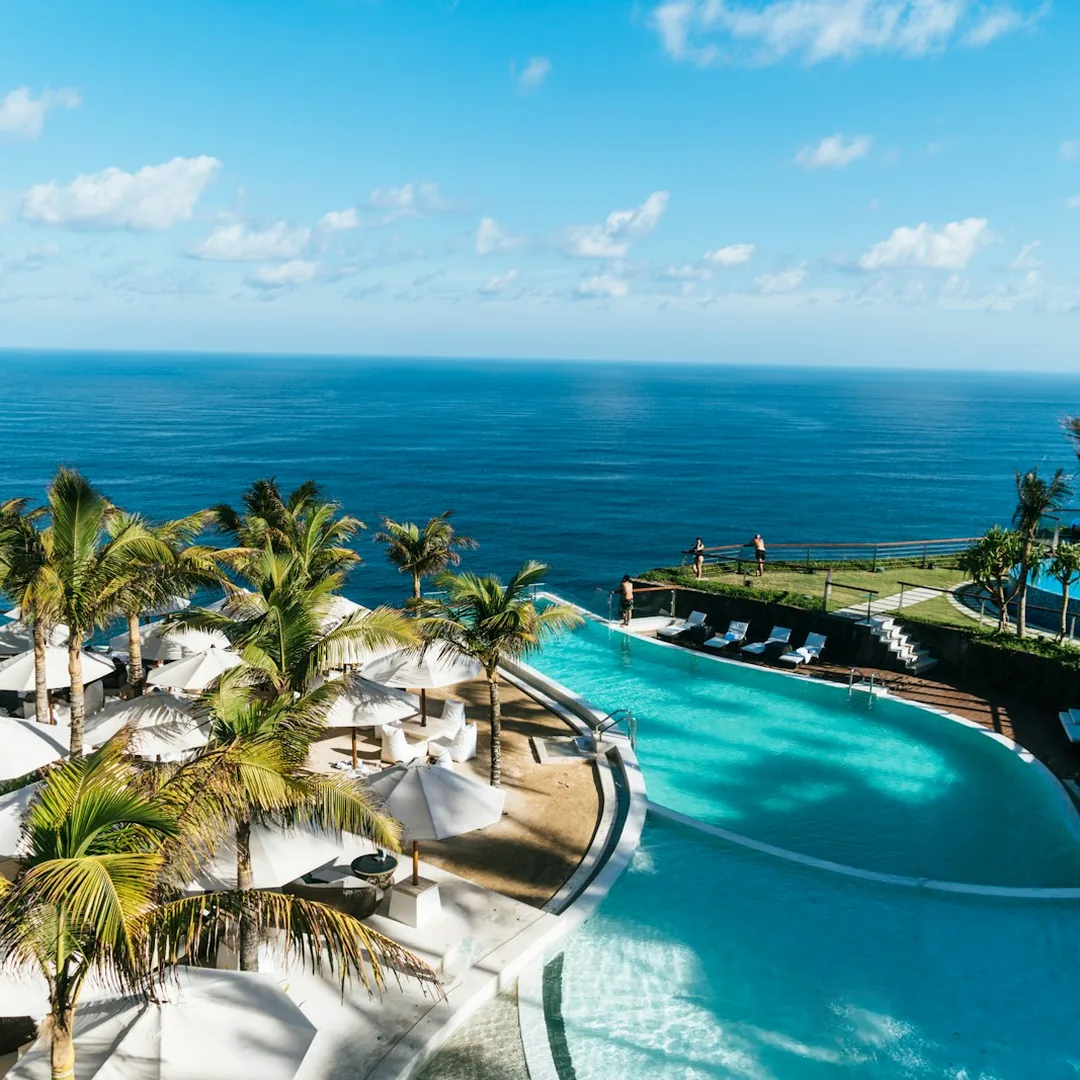 Luxury tropical resort pool overlooking the ocean in Thailand