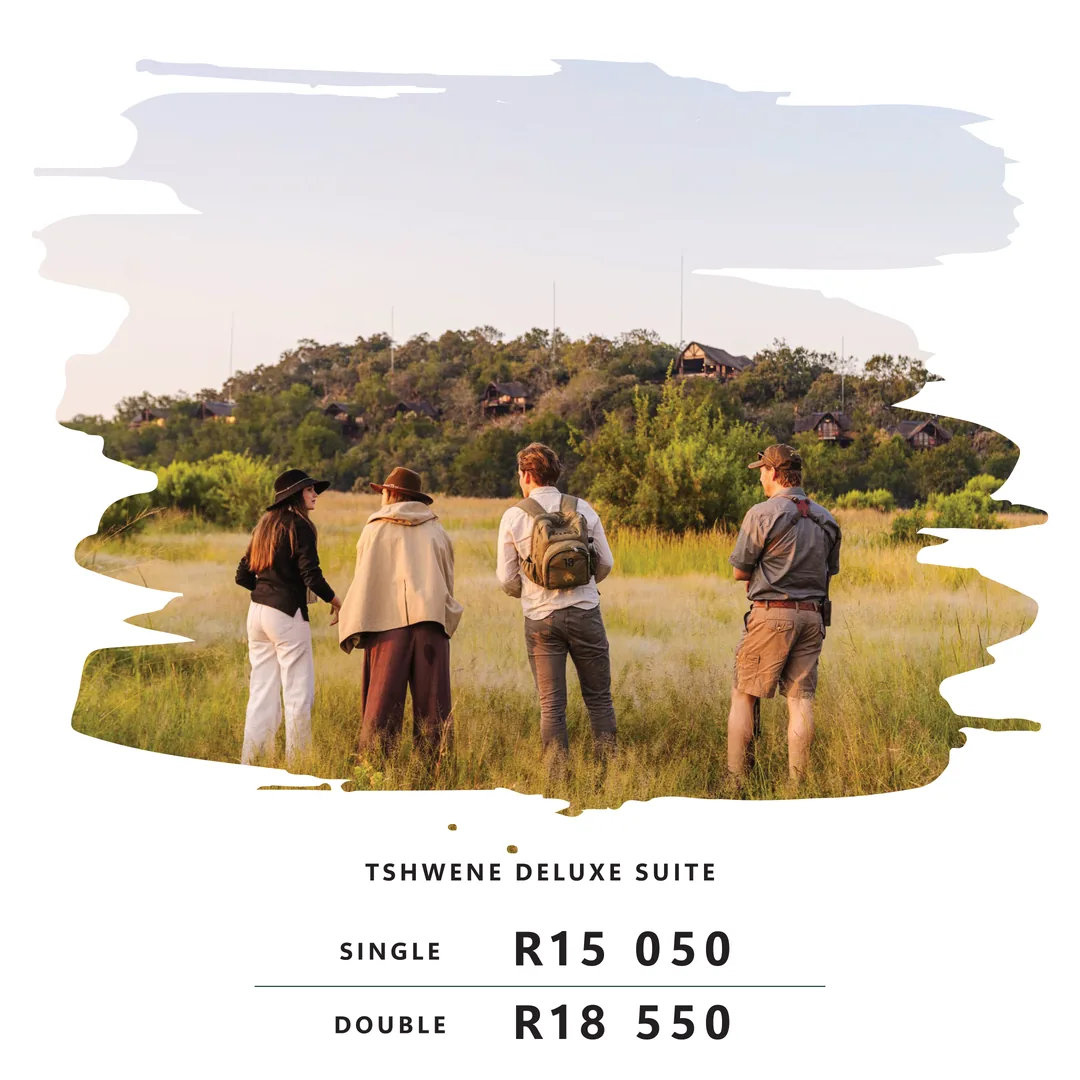 Tshwene Deluxe Suite at Tshukudu Bush Lodge - guests looking toward the lodge